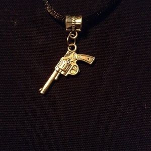 Silver tone Gun necklace with black cord. 2/$10